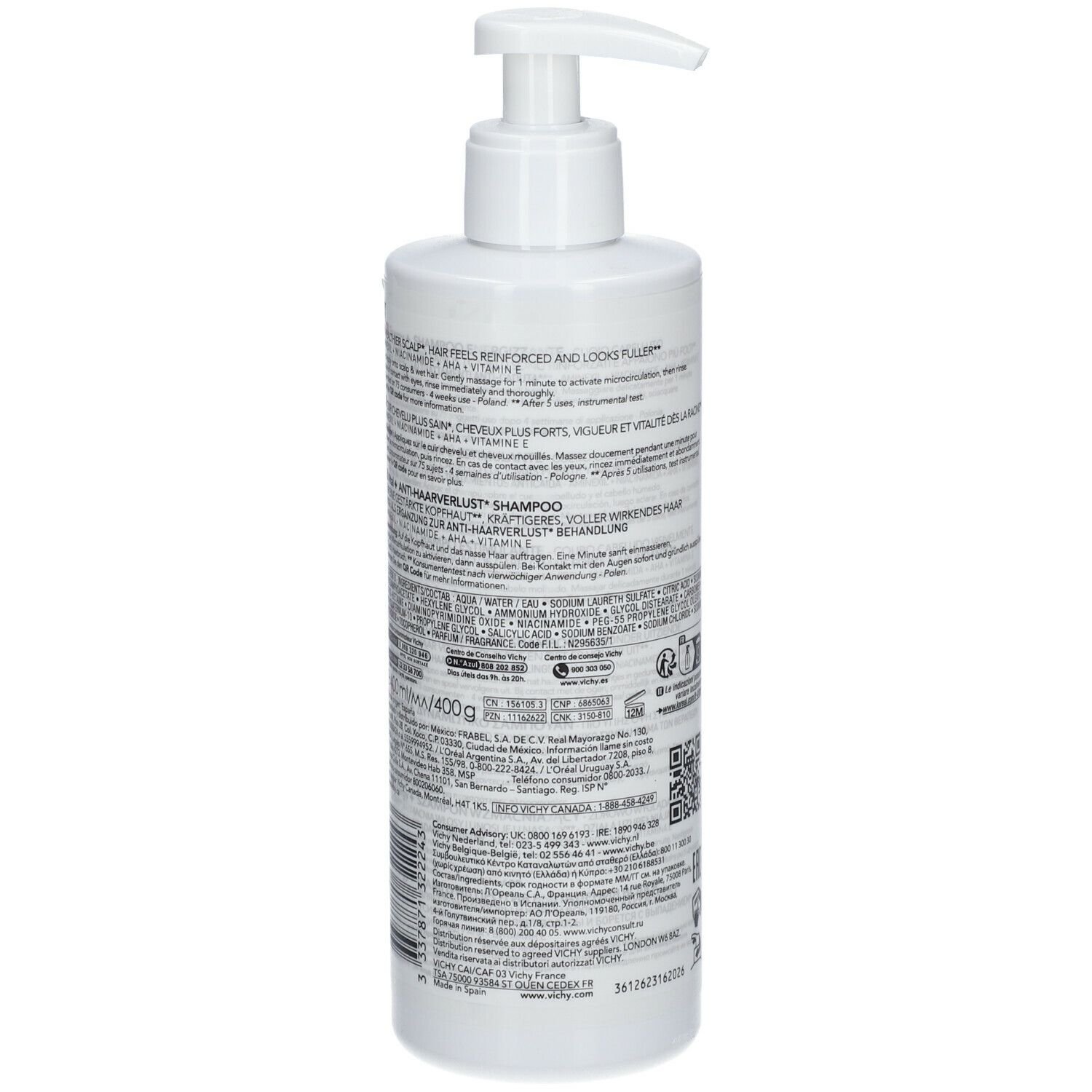 Achterkant van de fles. Tekst: Dercos, Energy+, Stimulating Shampoo. Ingrediënten, gebruiksaanwijzing.