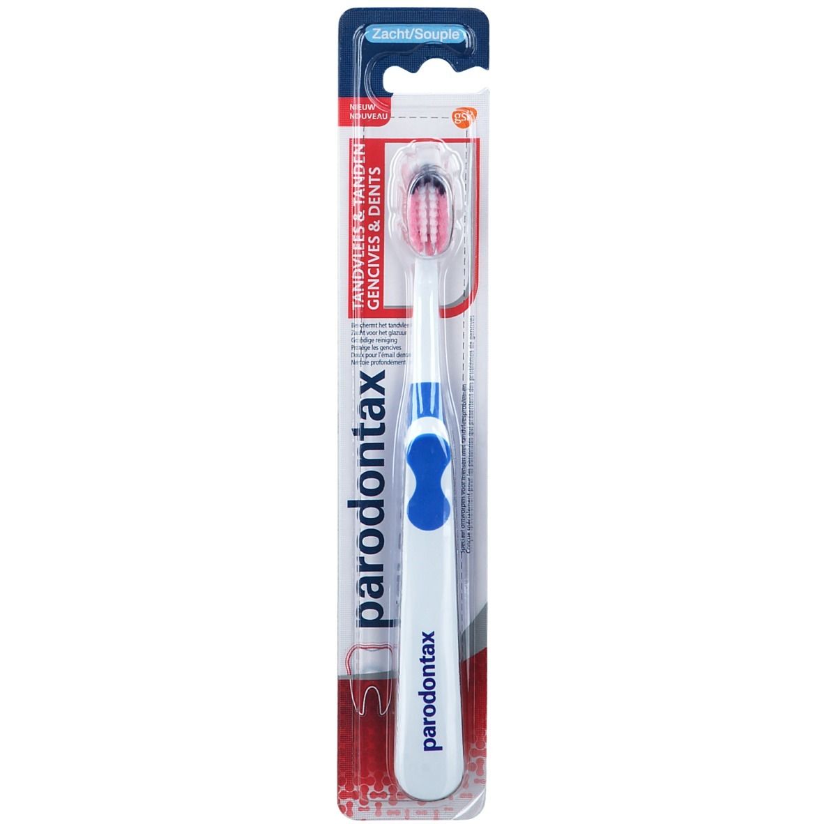 Brosse à dents dans emballage. Manche blanc avec insert bleu, tête de brosse rouge. Marque: Paradontax. Texte: Tandvlees & tanden, Zacht/Souple.