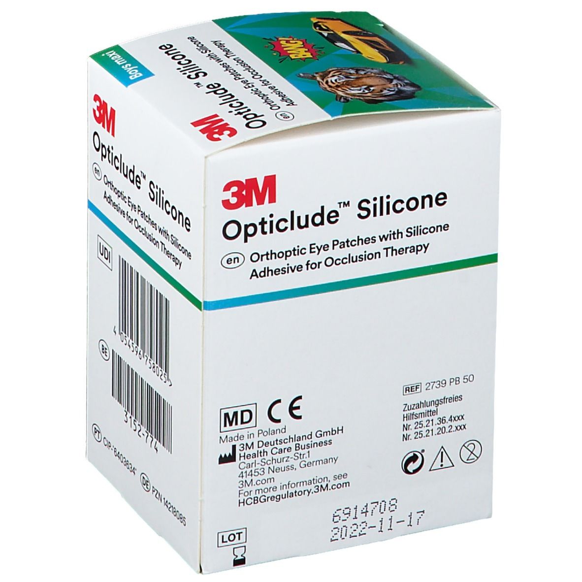 Boîte de 3M Opticlude Silicone. Informations sur le produit et marquage CE. Un garçon avec un patch oculaire est représenté sur l'emballage.