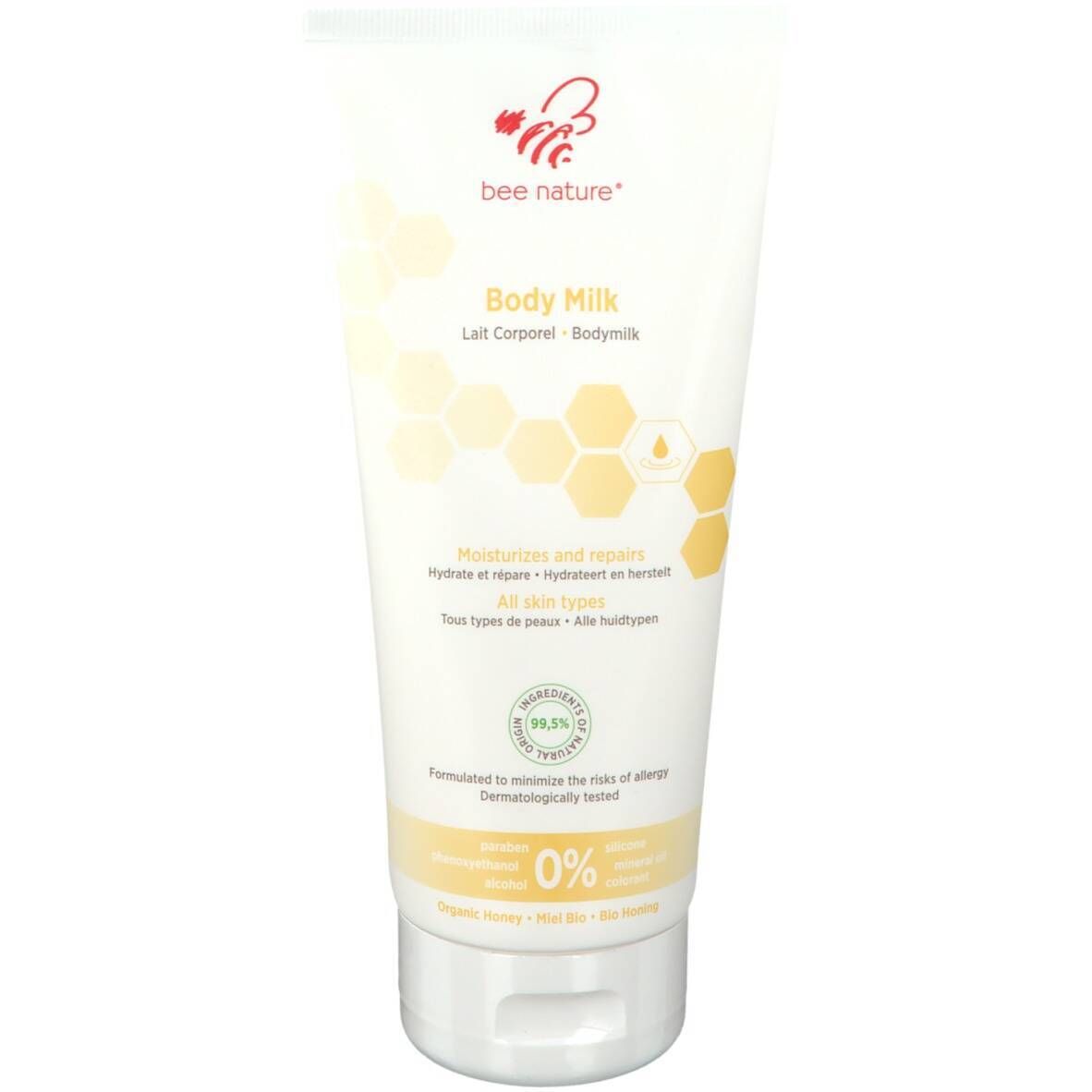 Tube blanche avec logo "bee nature" et nom du produit "Body Milk". Graphique en nid d'abeilles jaune. "All skin types".