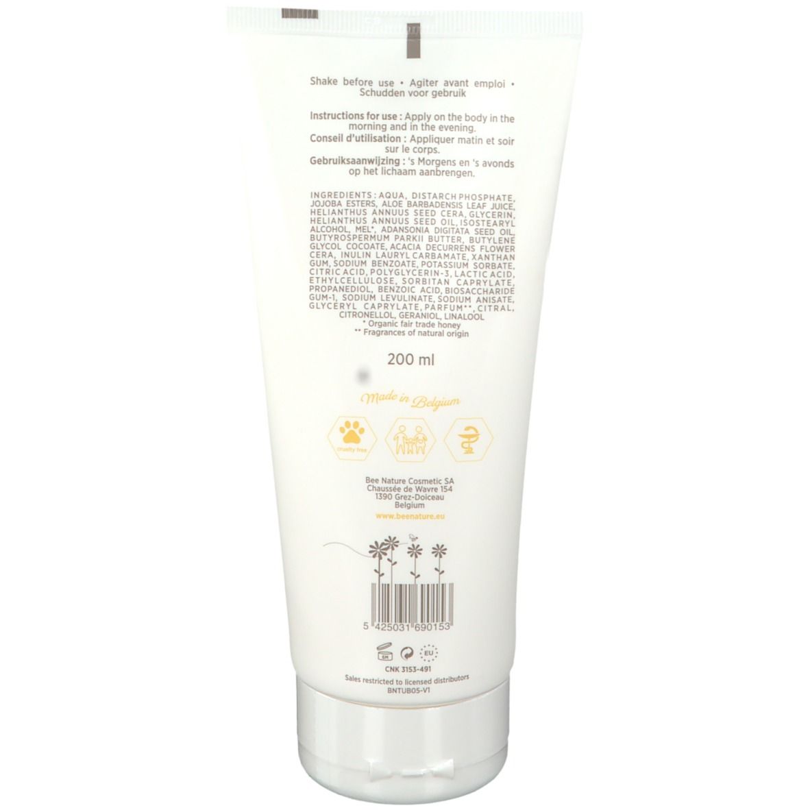 Dos d'un tube blanc. Texte avec ingrédients et instructions d'utilisation. "200 ml". Logos: abeille, nid d'abeilles, label bio.