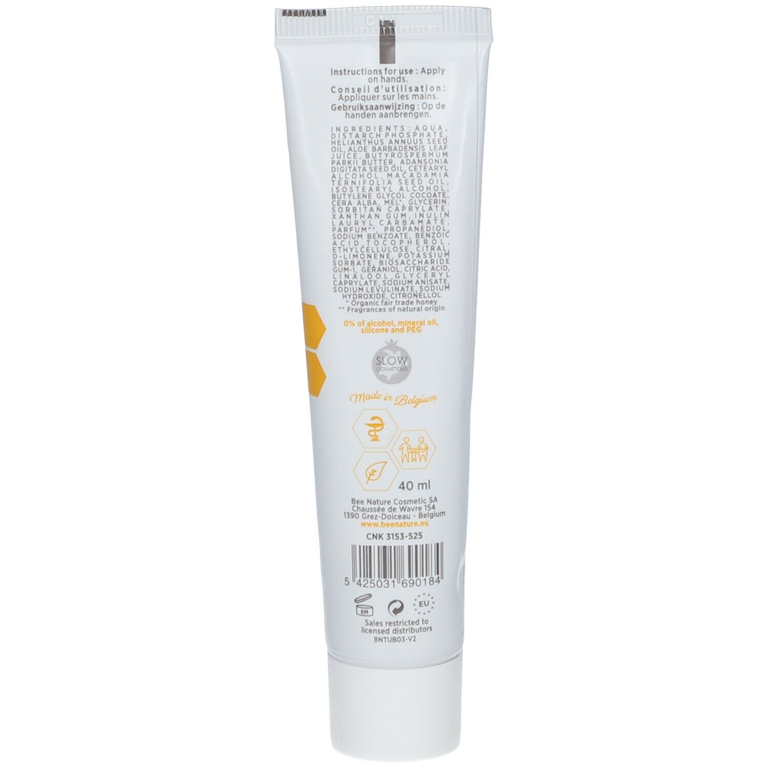 Dos du tube de crème pour les mains. Contient des informations sur les ingrédients, l'utilisation et le fabricant. Avec motif en nid d'abeille et logo.