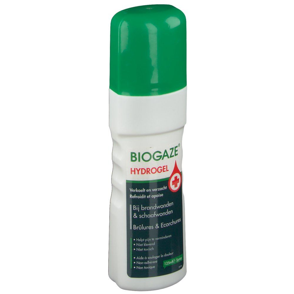 Flacon blanc avec bouchon vert. Nom du produit et texte sur l'étiquette. Symbole de croix rouge. 125ml.