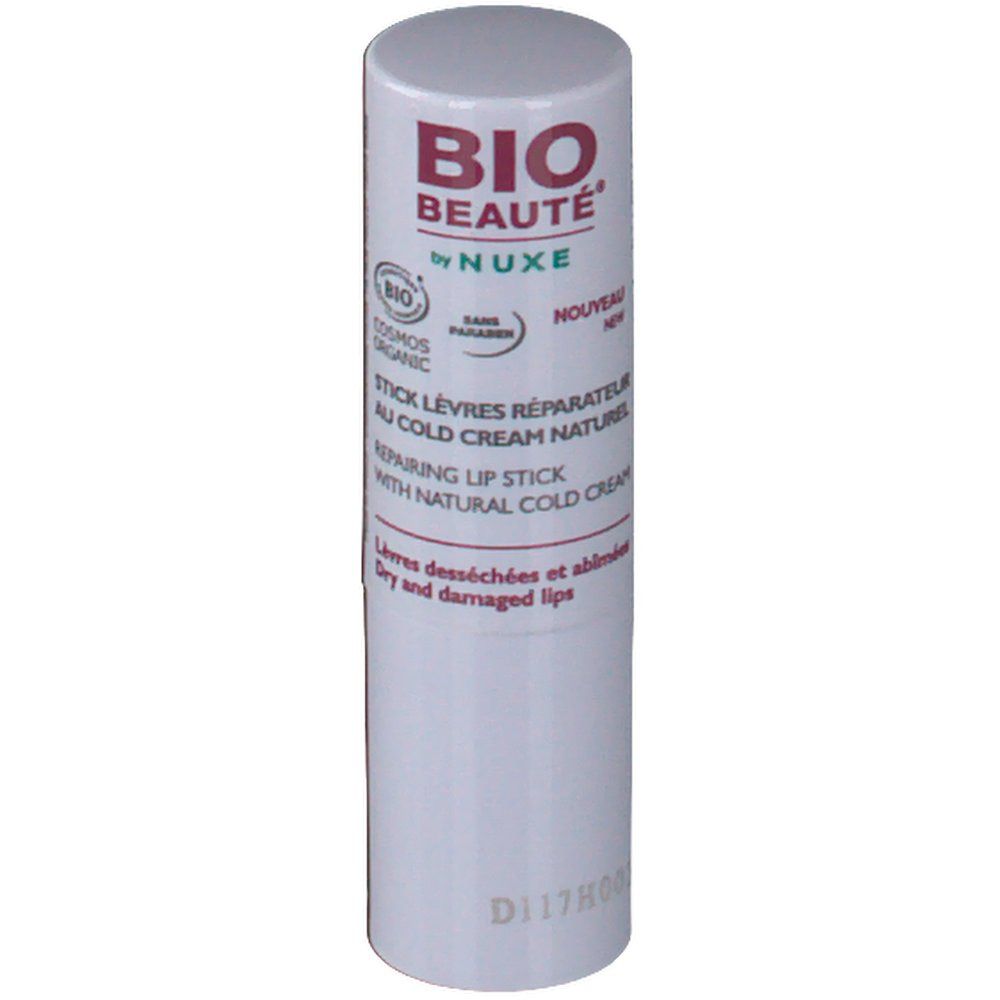 Stick lèvres réparateur. Tube blanc avec texte rouge et violet. Inscription: BIO BEAUTÉ by NUXE, Stick Lèvres Réparateur au Cold Cream Naturel.