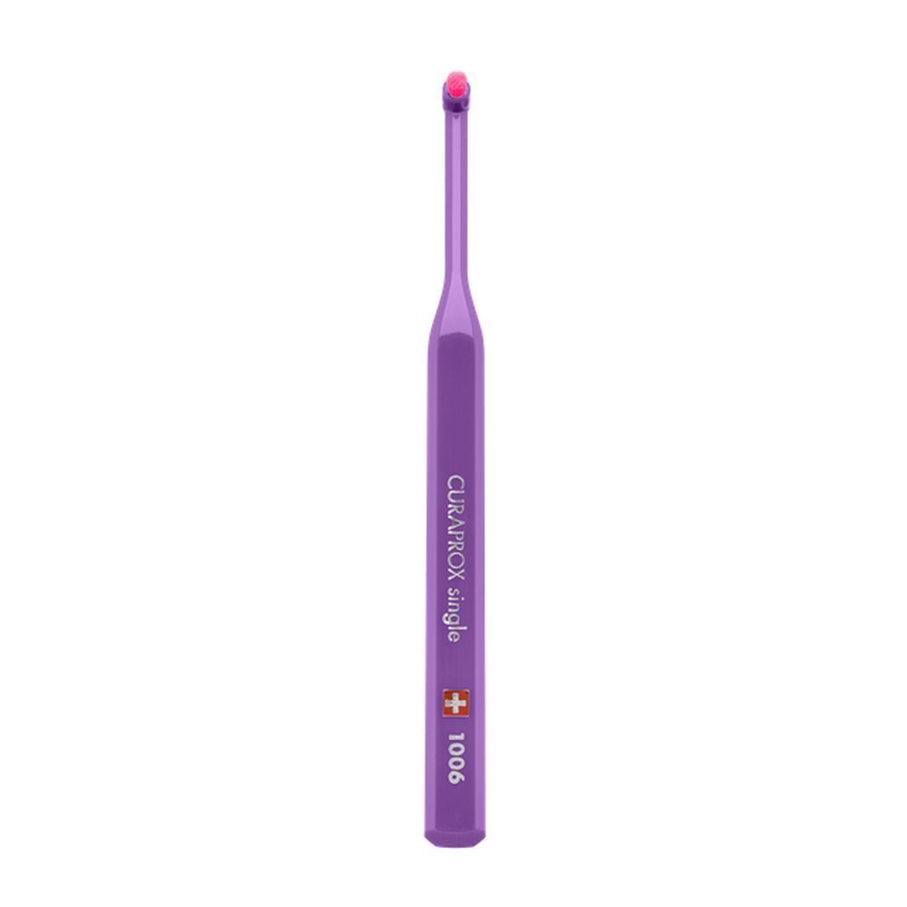Brosse à dents Curaprox CS 1006 single. Manche violet, tête de brosse rouge. Marque CURAPROX.