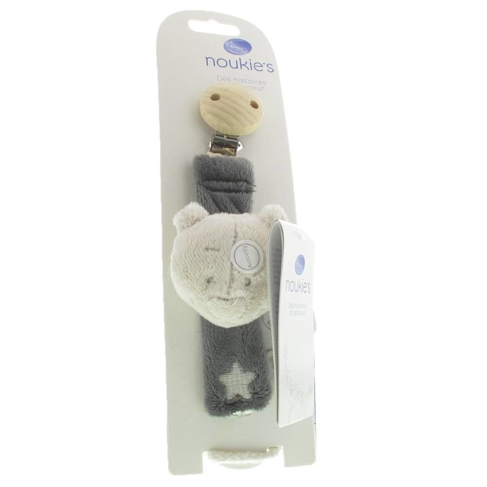 Attache-tétine avec application ours, clip en bois et motif étoile. Sur carton avec logo de la marque.
