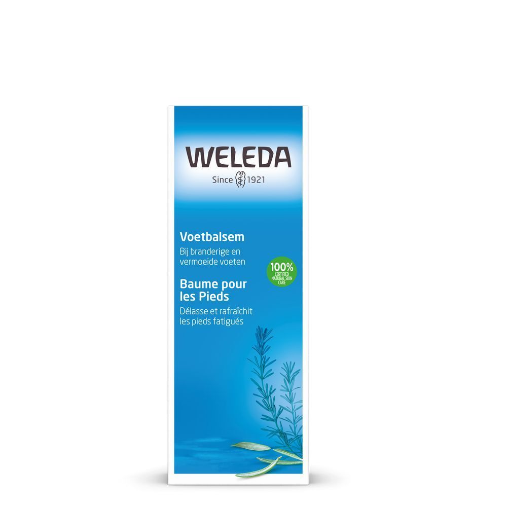 Emballage Weleda Baume pour les pieds. Boîte rectangulaire avec fond bleu. Texte en néerlandais et français. Branche verte.
