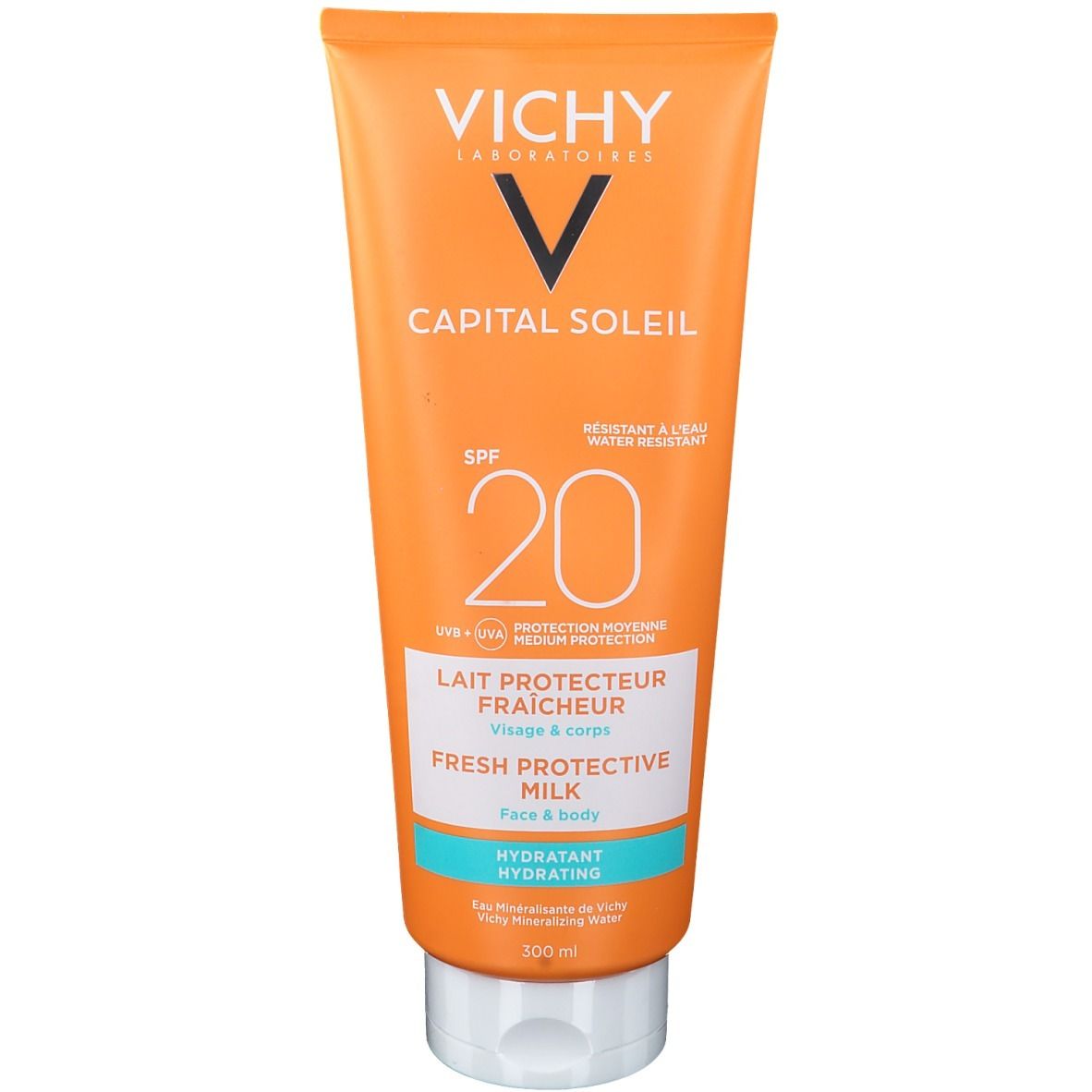 Tube orange avec bouchon blanc. VICHY CAPITAL SOLEIL Lait Protecteur Fraicheur SPF20. Texte: Lait Protecteur Fraicheur, Fresh Protective Milk, Visage & corps.