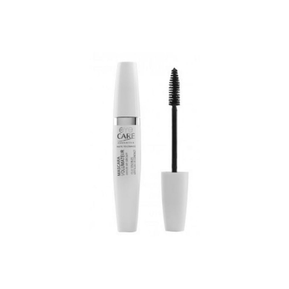 Tube de mascara blanc avec brosse noire. Nom du produit et logo visibles.