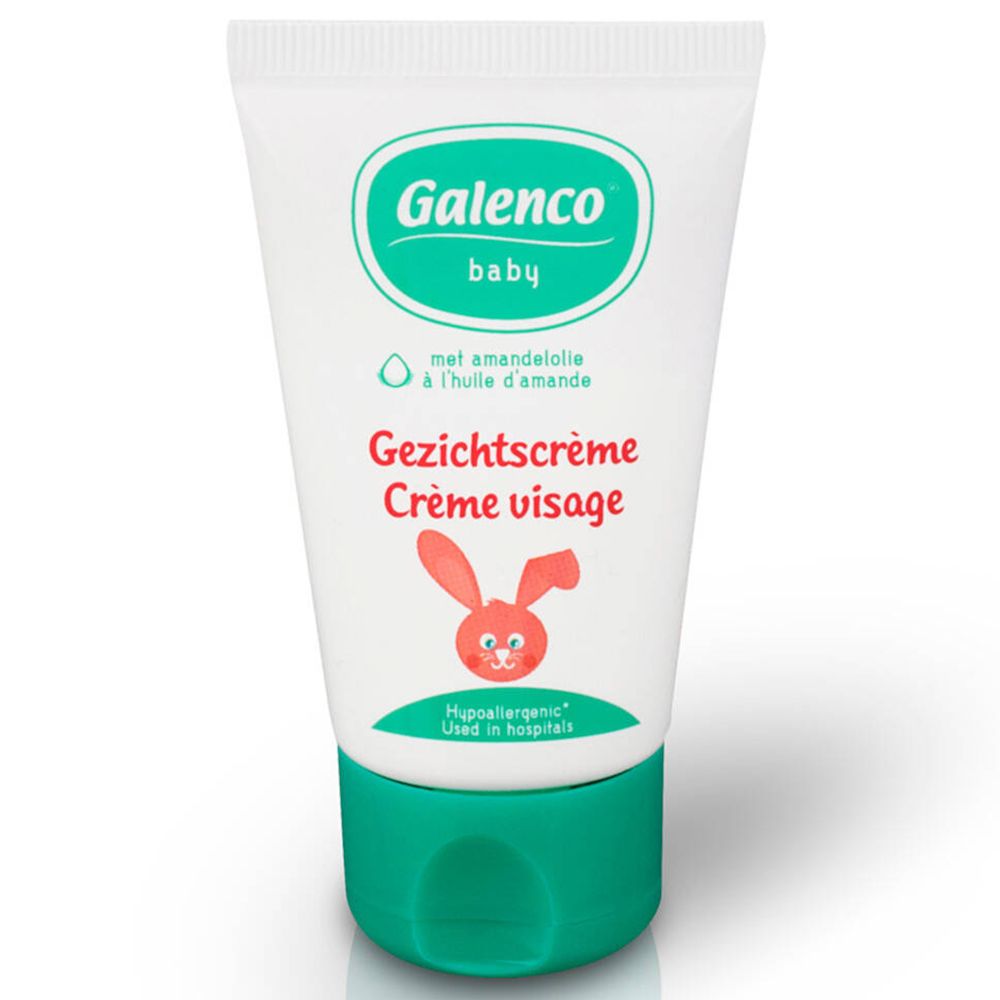 Tube de crème avec bouchon vert. Inscription: Galenco baby, Gesichtscrème, Crème visage. Avec huile d'amande. Image d'un lapin.