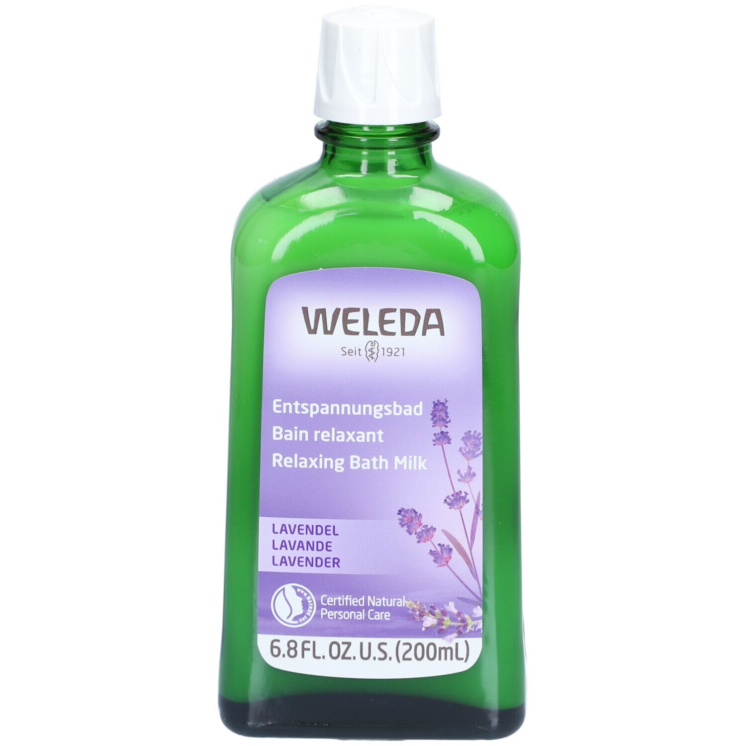 Flacon en verre vert avec bouchon blanc. Étiquette avec nom du produit, illustration de lavande et logo Weleda.