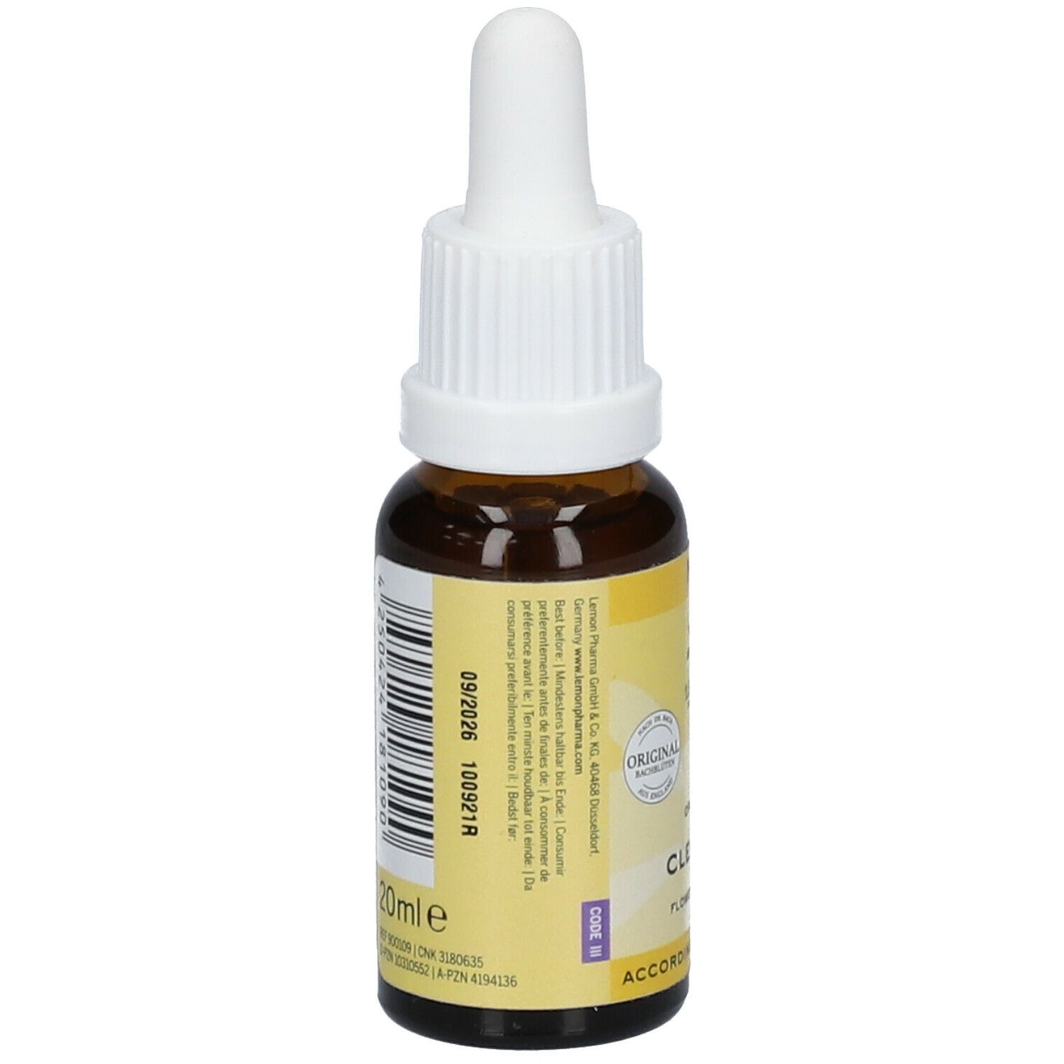Vue arrière du flacon en verre brun avec bouchon blanc. Étiquette avec texte et numéro de lot. Flacon de 20 ml.