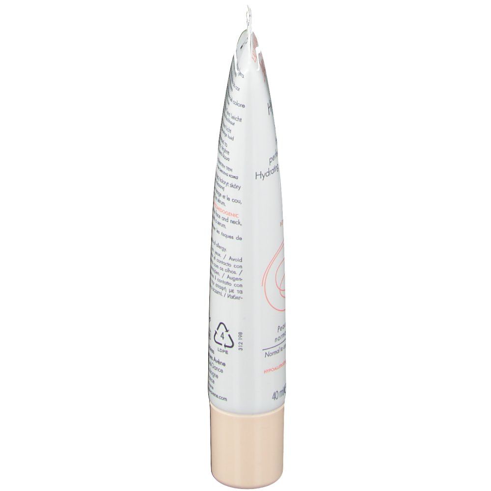 Vue latérale du tube de crème. Texte et logos sur fond blanc. Bouchon beige.