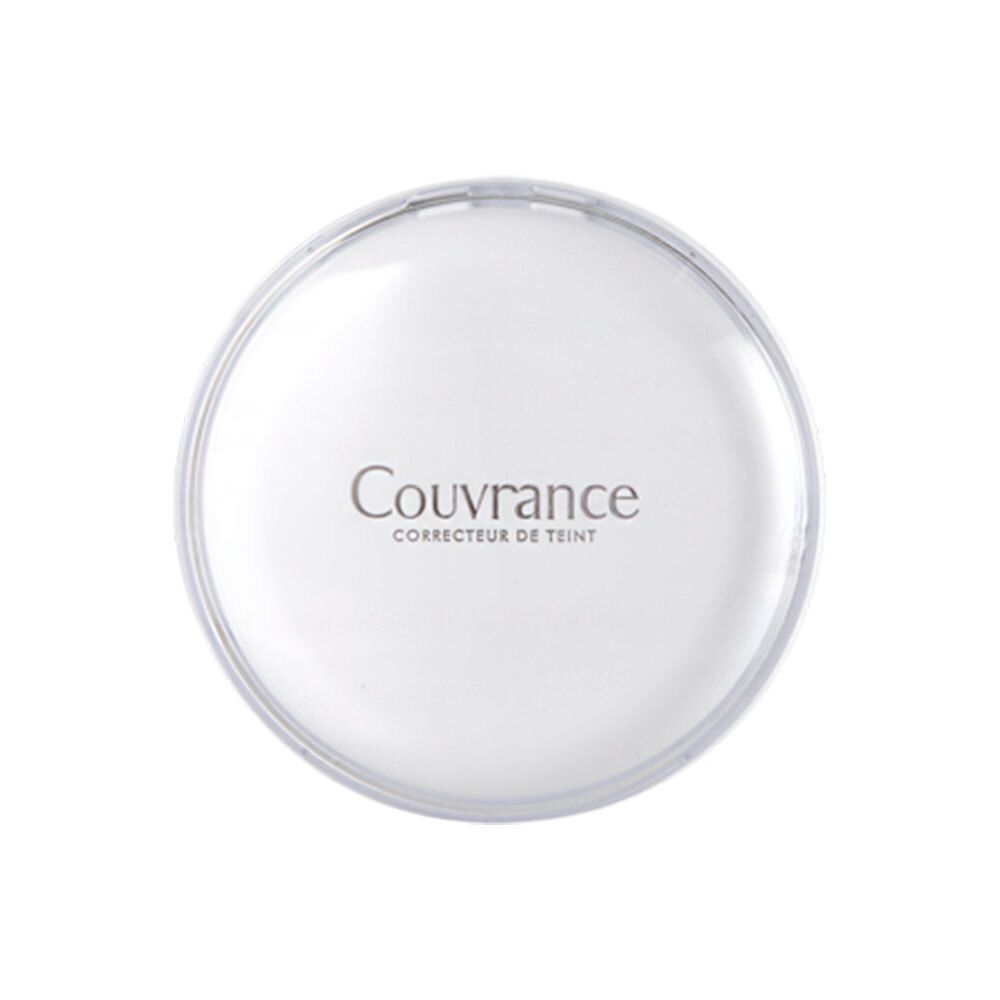 Contenitore compatto bianco chiuso. Scritta Couvrance, Correcteur de Teint.