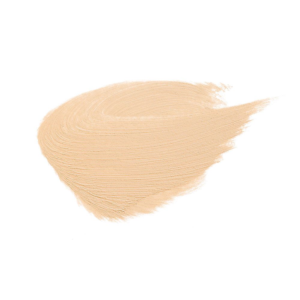 Échantillon de maquillage clair et crémeux sur fond blanc.