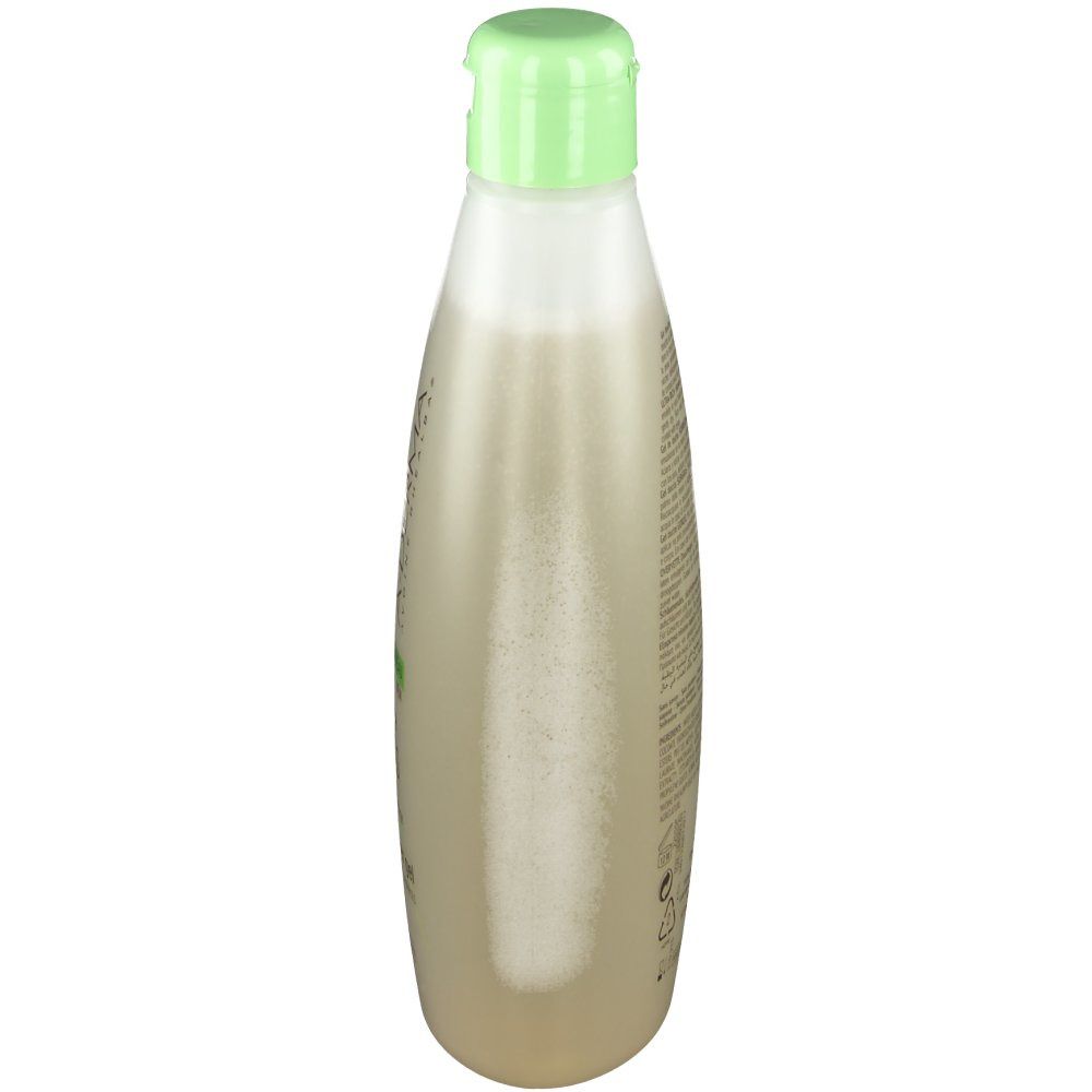 A-Derma Hafermilch Duschgel Überfett. Bouteille avec bouchon vert. Gel beige translucide. Inscriptions.