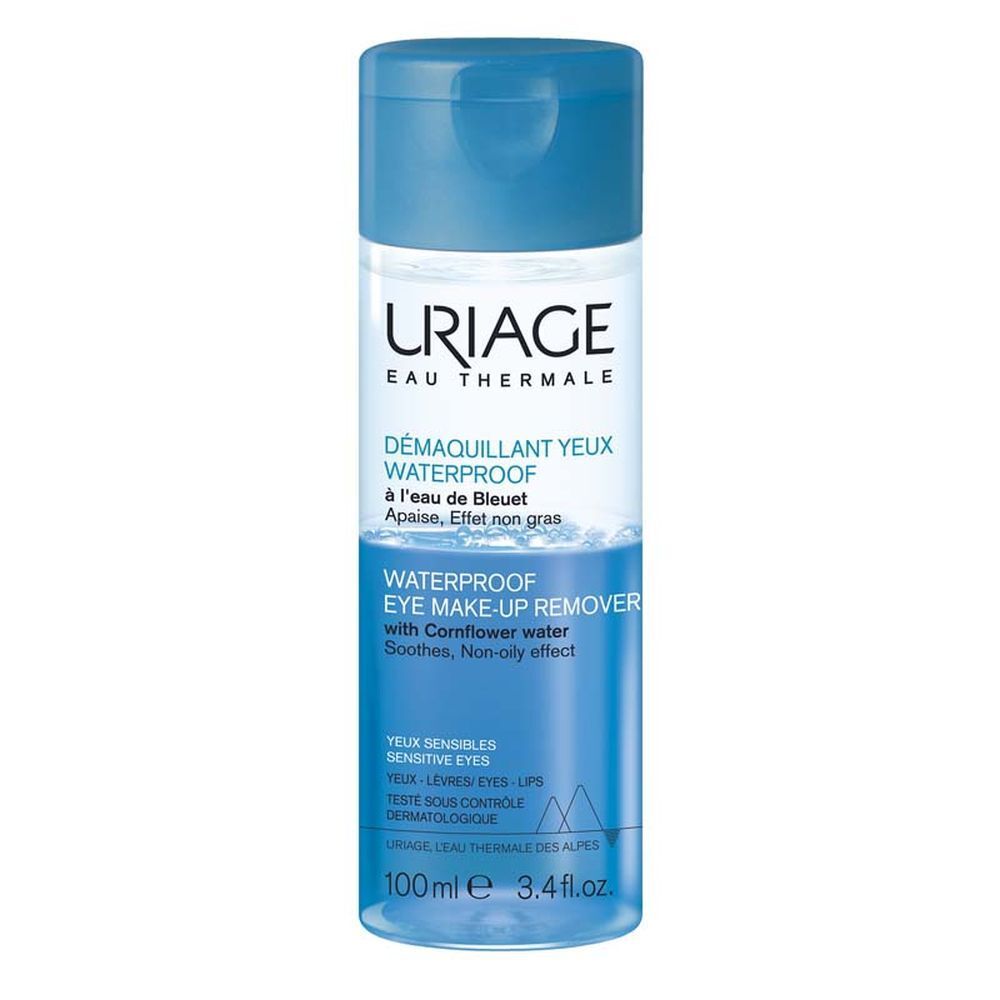 Démaquillant yeux Uriage. Flacon bleu avec bouchon bleu. Texte sur le flacon.