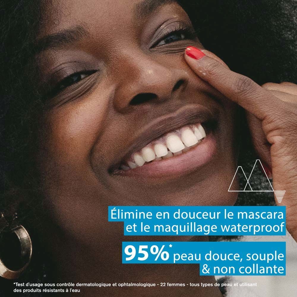Démaquillant yeux Uriage. Flacon bleu avec bouchon bleu. Texte sur le flacon.