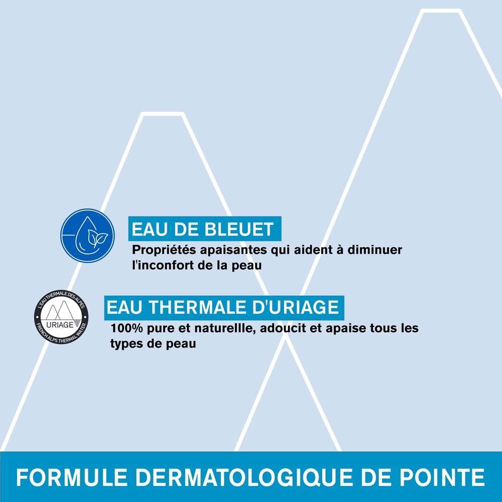 Démaquillant yeux Uriage. Flacon bleu avec bouchon bleu. Texte sur le flacon.