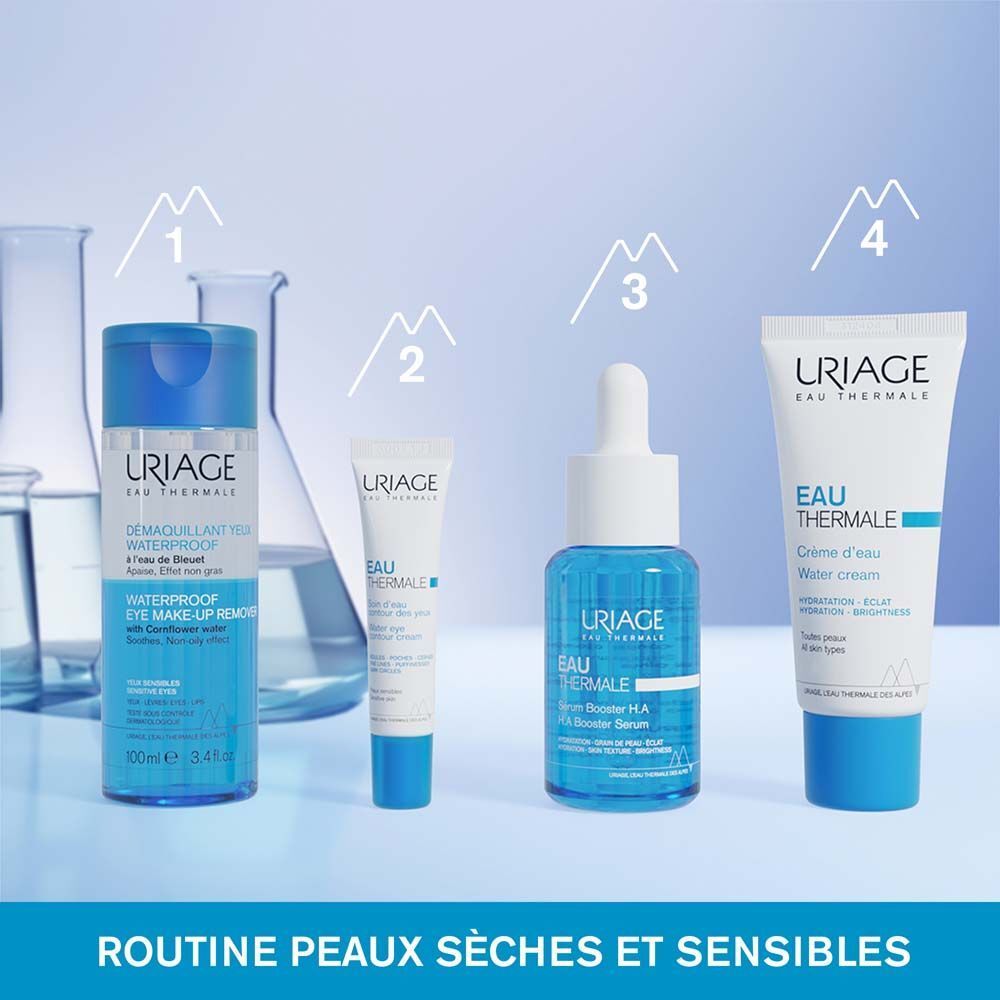Démaquillant yeux Uriage. Flacon bleu avec bouchon bleu. Texte sur le flacon.