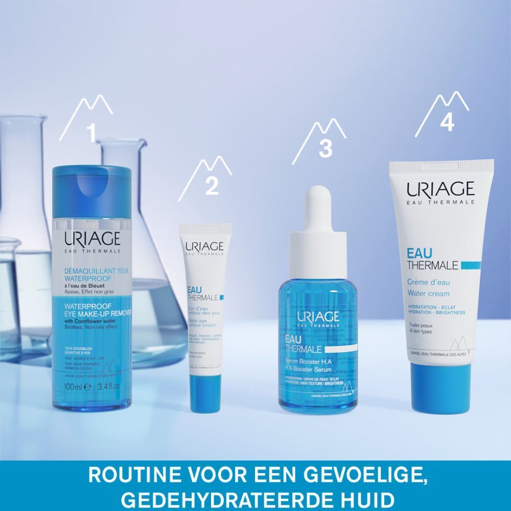 Uriage oogmake-up remover. Blauwe fles met blauwe dop. Tekst op de fles.