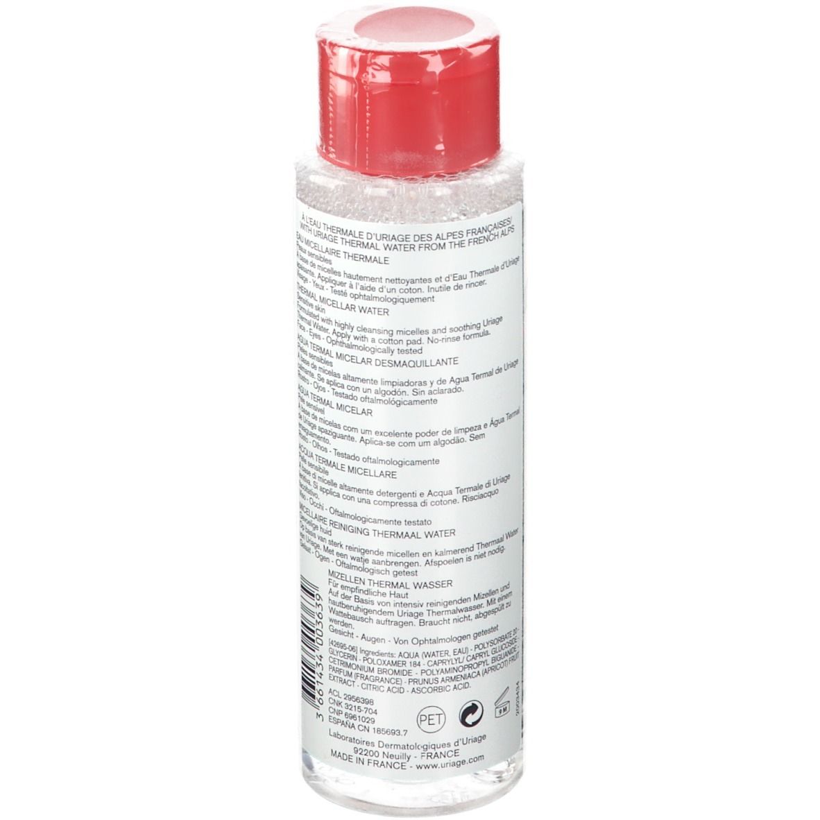 Flacon transparent avec bouchon rouge. Texte au dos. Nom du produit non visible. Ingrédients et informations fabricant.