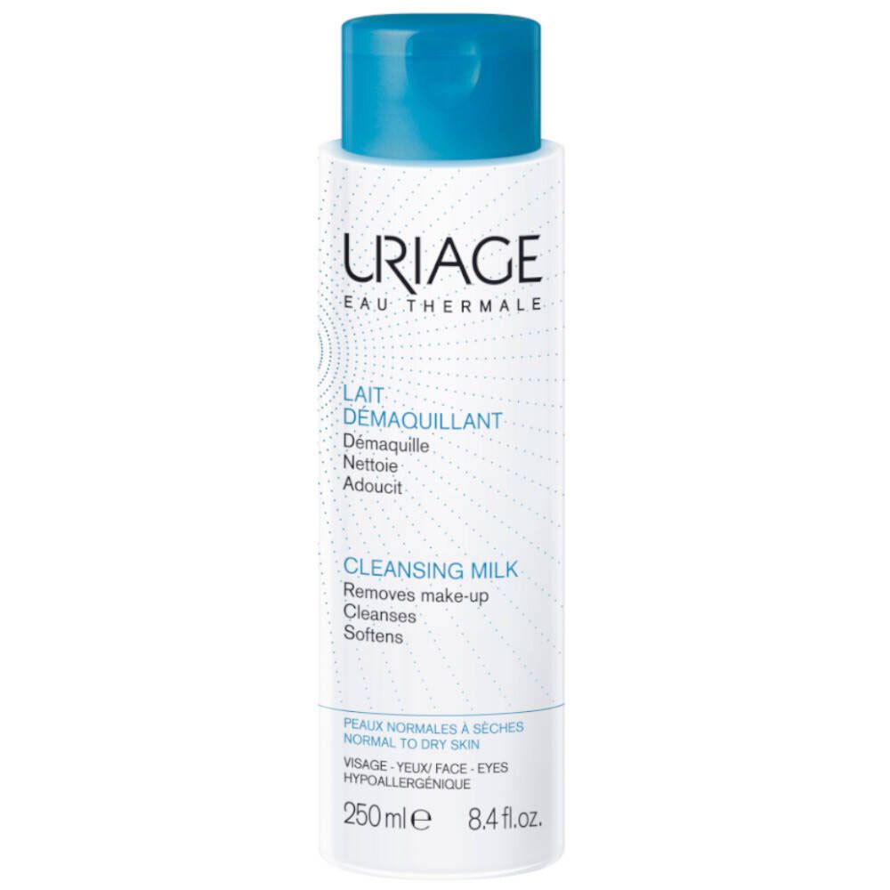 Flacon blanc Uriage Lait Démaquillant avec bouchon bleu. Texte: Lait Démaquillant, Cleansing Milk. Pour peaux normales à sèches.