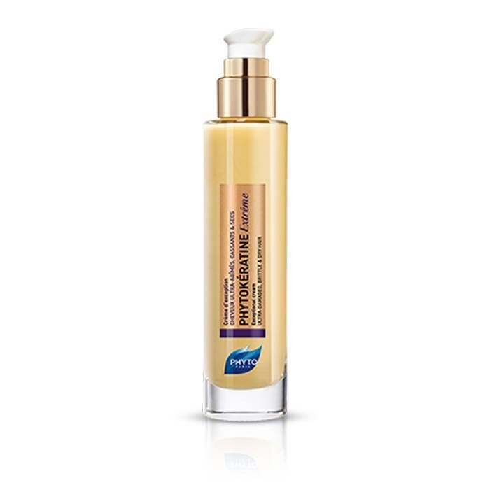 Flacon crème avec pompe dorée. Inscription PHYTOKÉRATINE Extrême. Pour cheveux ultra-abîmés.