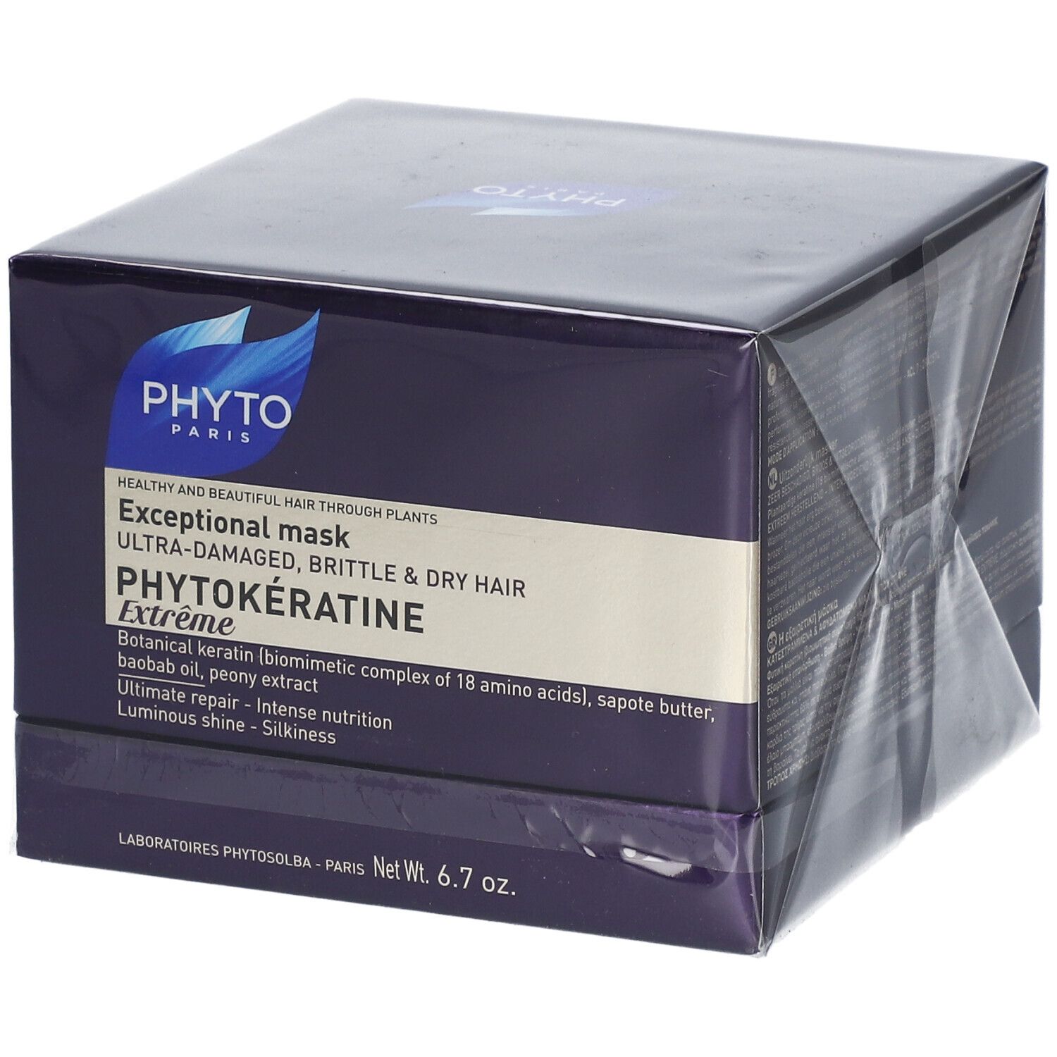 Boîte violet foncé avec logo et nom du produit. Texte : PHYTOKÉRATINE Extrême. Net 6.7 oz.