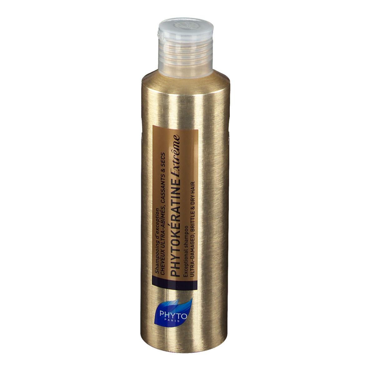 Flacon de shampooing doré avec bouchon blanc. Inscription : PHYTOKÉRATINE Extrême, pour cheveux ultra-abîmés.