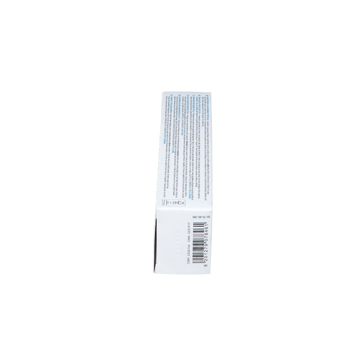 Weiße Schachtel, Seitenansicht. Text in mehreren Sprachen. Enthält Informationen über das Produkt und Hersteller.