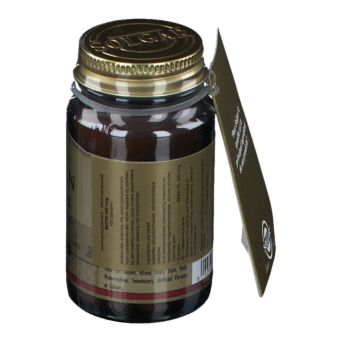Flacon en verre brun avec couvercle doré. Étiquette avec texte. Étiquette volante avec texte. Anneau de fermeture transparent.