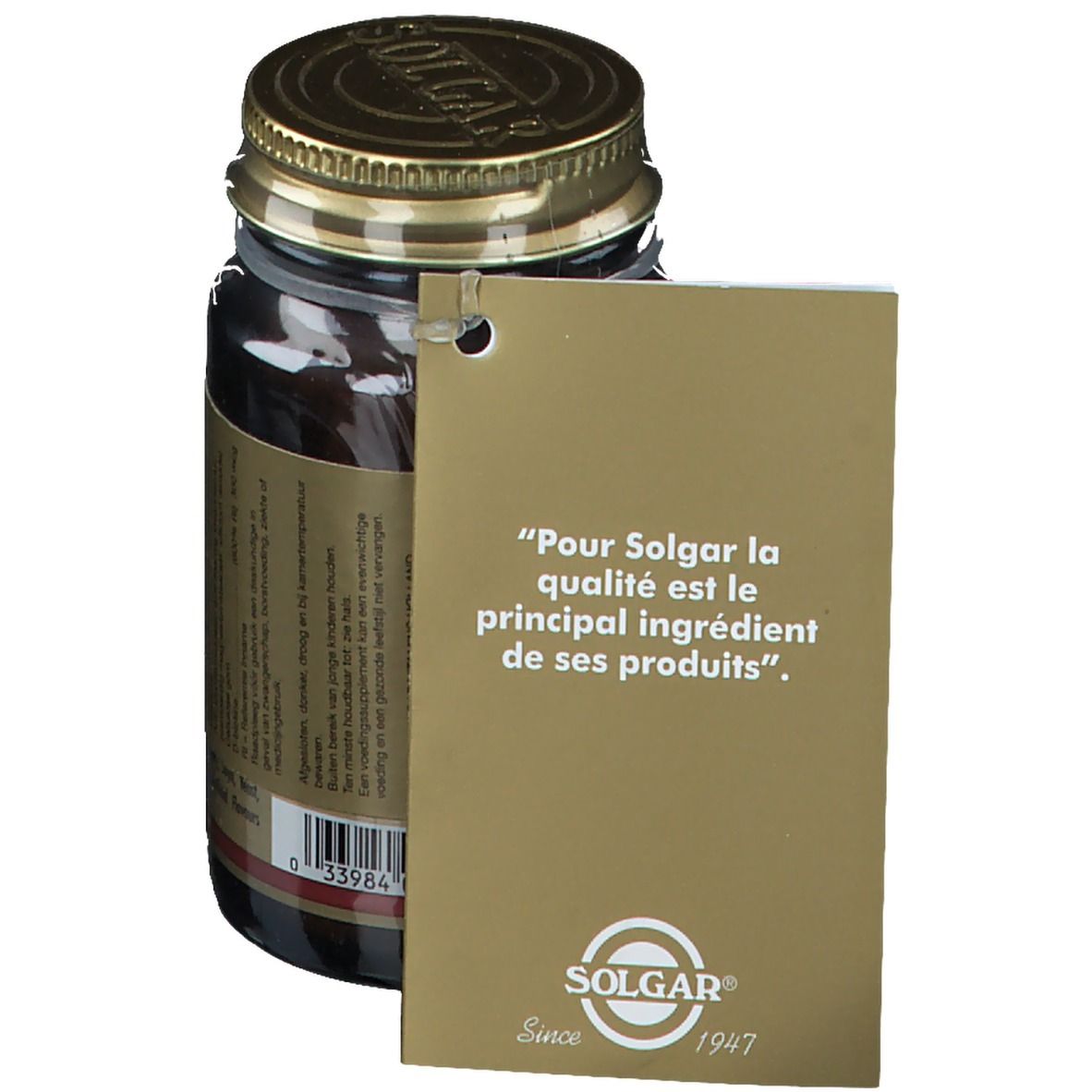 Flacon en verre brun avec couvercle doré. Étiquette volante avec texte: "Pour Solgar la qualité est le principal ingrédient de ses produits".