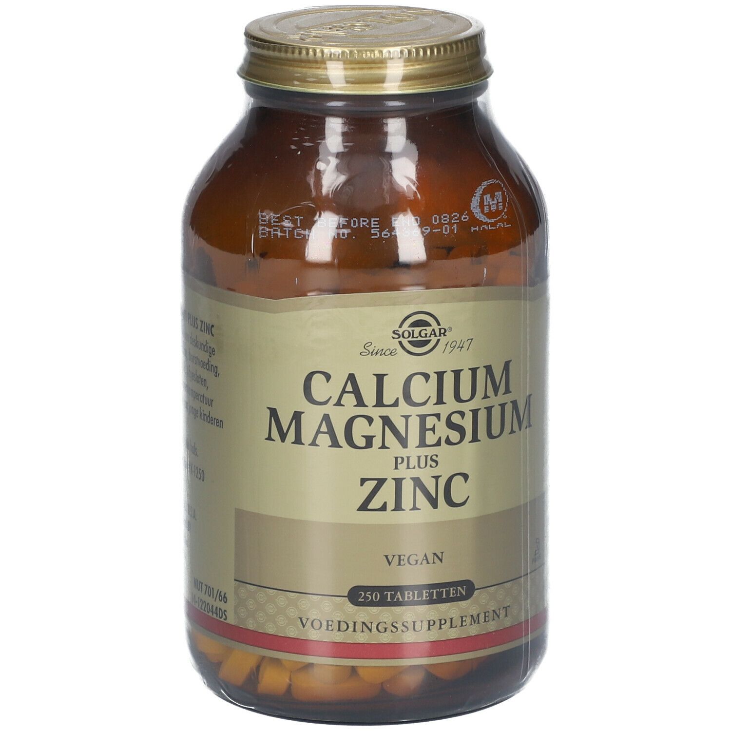 Flacon en verre brun avec couvercle doré. L'étiquette indique "Calcium Magnesium Plus Zinc" et "250 comprimés".