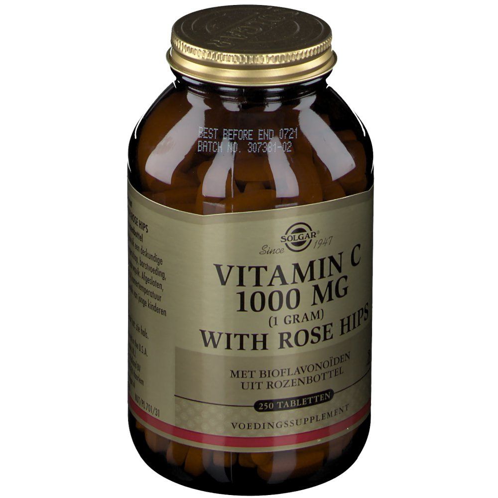 Flacon en verre brun avec couvercle doré. Étiquette "Solgar Vitamin C 1000 MG With Rose Hips". Contient 250 comprimés.