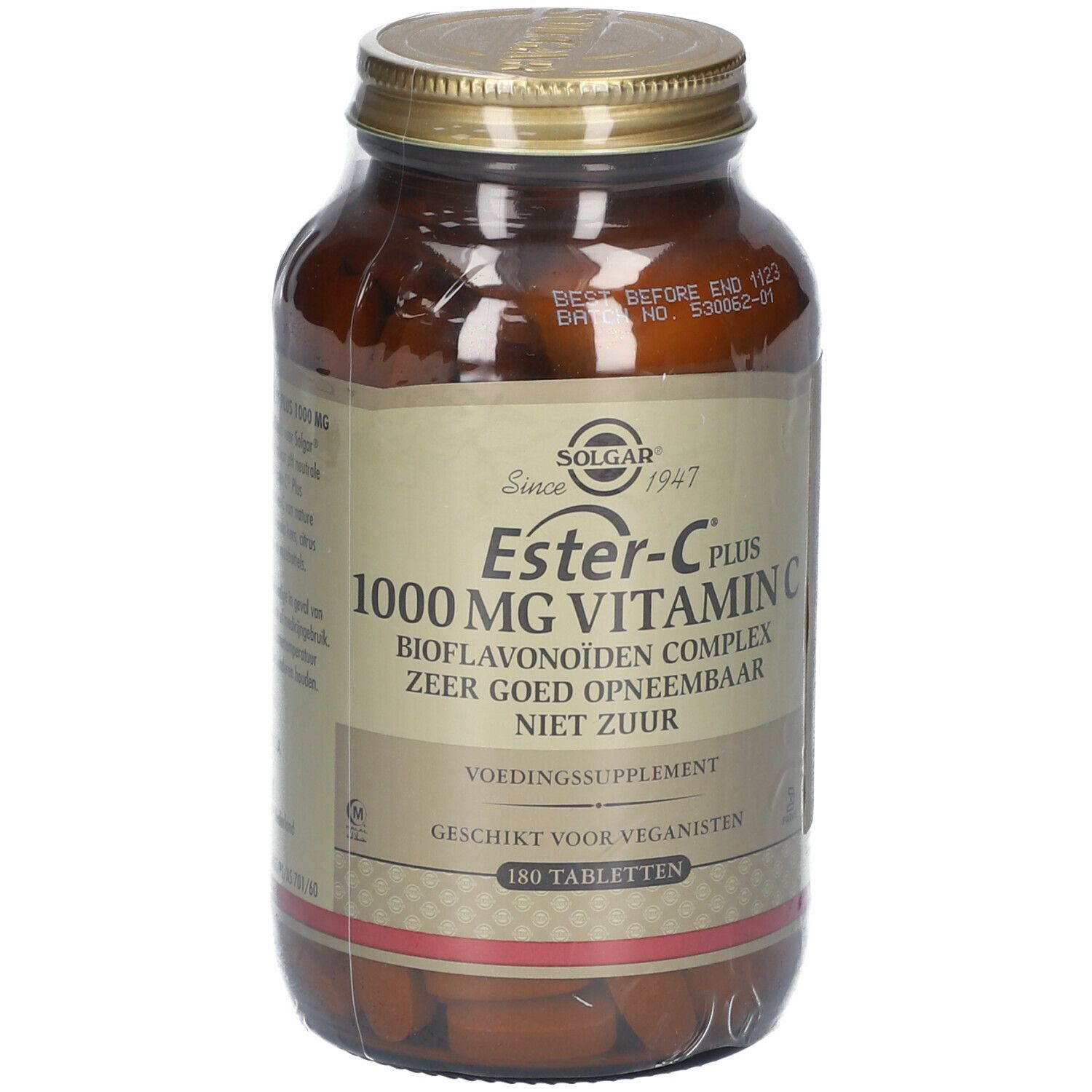 Flacon en verre brun avec bouchon doré. Étiquette avec informations produit: Ester-C Plus 1000 mg Vitamine C.