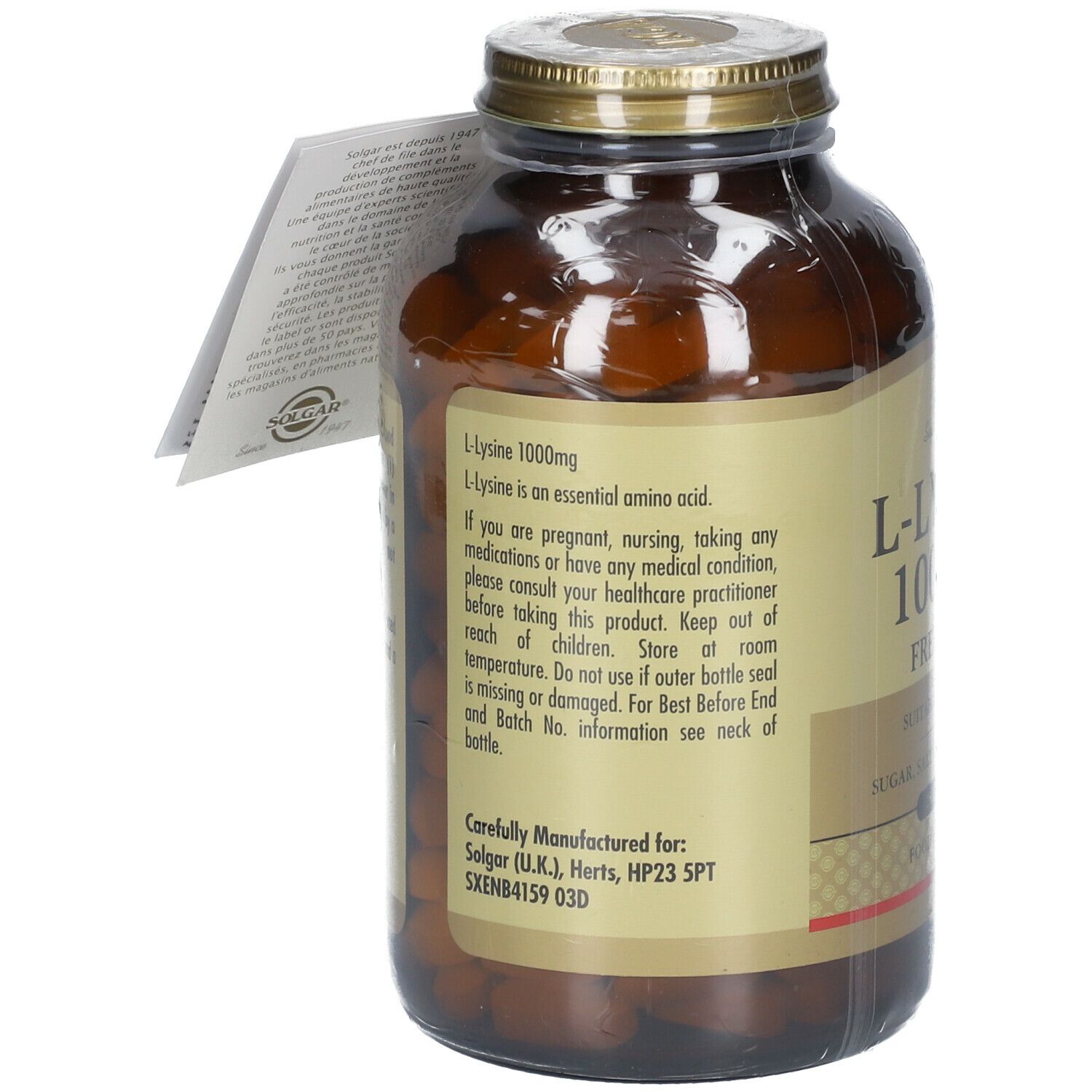 Braune Glasflasche mit goldfarbenem Deckel. Etikett mit Produktinformationen. Anhänger mit Text. Klare Plastikfolie.