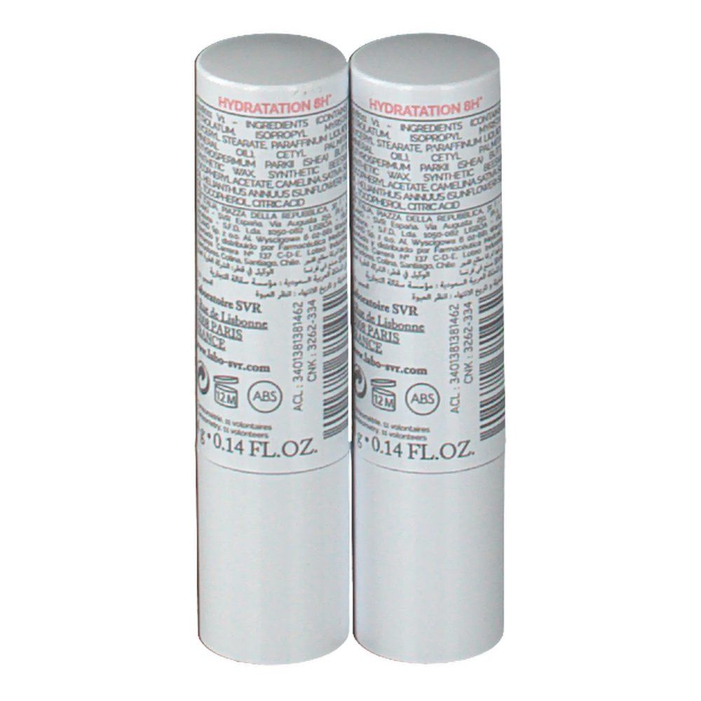 Twee witte lippenstiften. Achterkant met ingrediënten en barcode. Opschrift: 0.14 FL.OZ.
