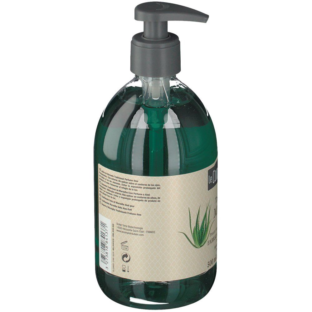 Groene vloeibare zeep in fles met pomp. Achterkant met tekst en etiket. Merk: Le Comptoir du Bain.