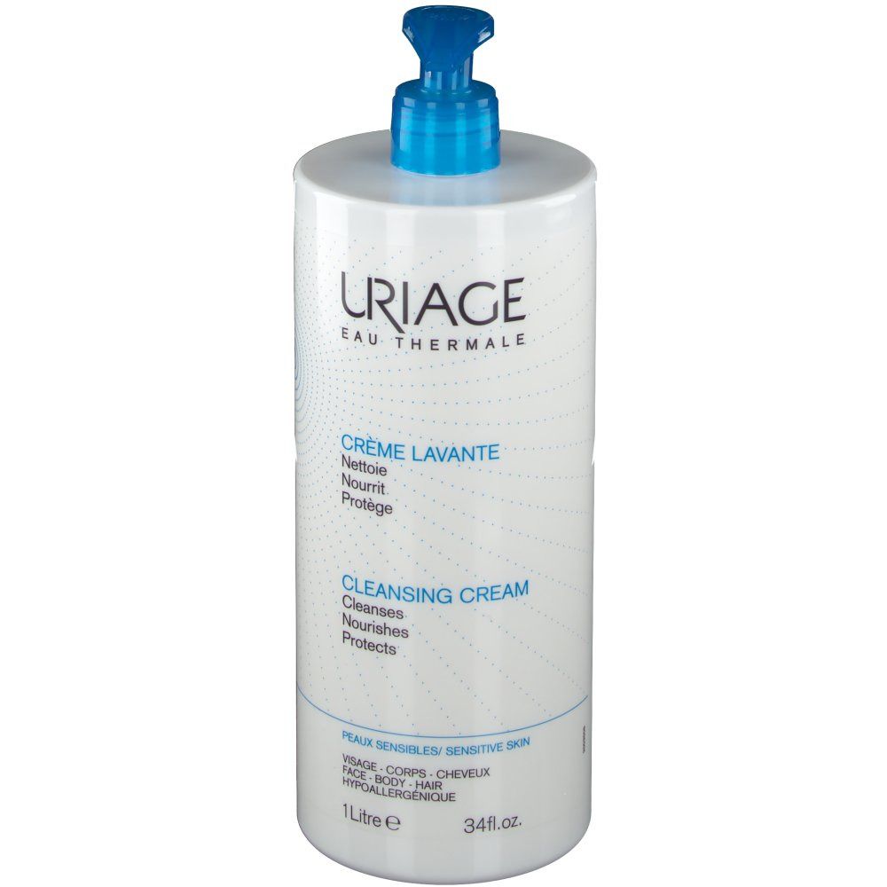 Flacon de Crème Lavante Uriage avec pompe bleue. Texte: Crème Lavante, Cleansing Cream. Pour peaux sensibles.