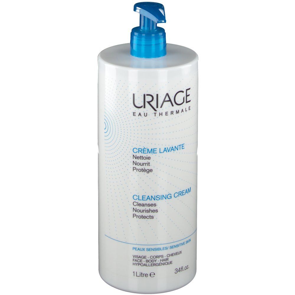 Flacon de Crème Lavante Uriage avec pompe bleue. Texte: Crème Lavante, Cleansing Cream. Pour peaux sensibles.