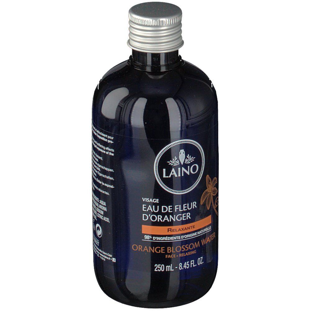 Blaue Flasche mit silbernem Deckel. Aufschrift: LAINO, Eau de Fleur d'Oranger, Orange Blossom Water. 250 ml.