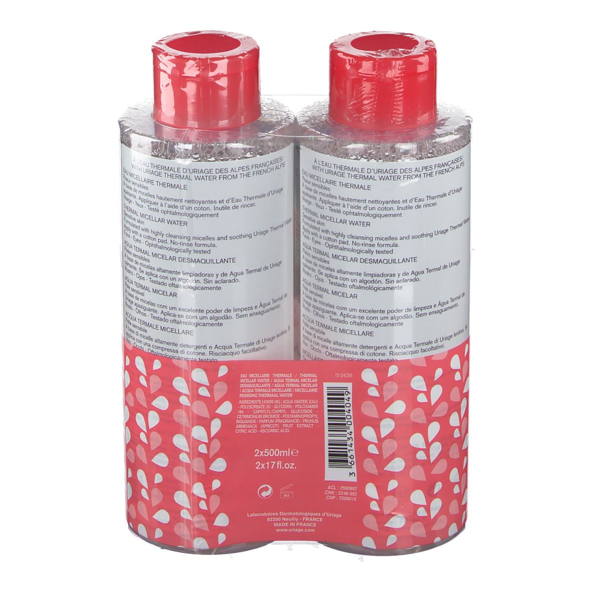 Deux flacons avec bouchons rouges, emballés. Inscriptions: URIAGE, Eau Thermale, Micellaire. Motif rose et blanc. 2x500ml.