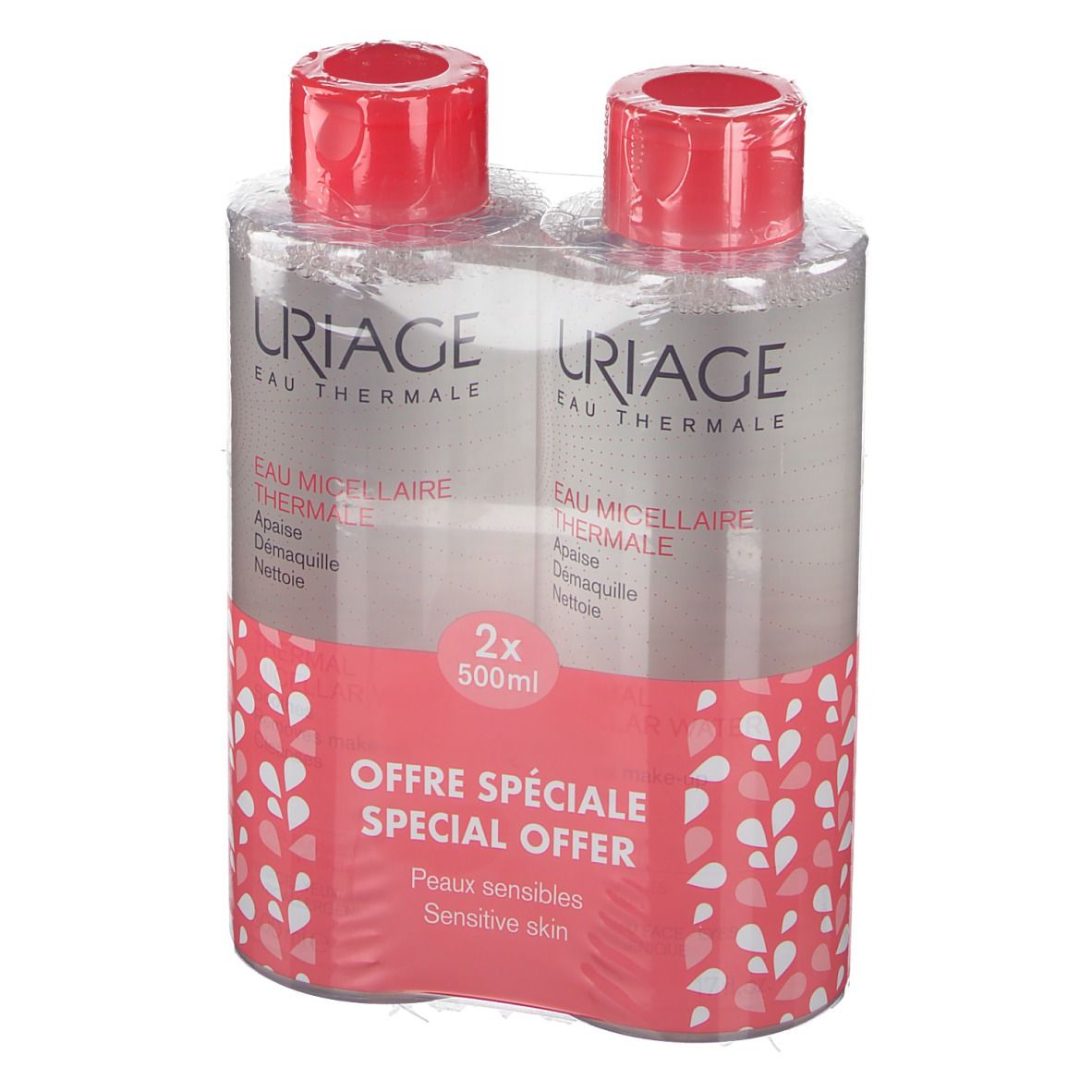 Deux flacons avec bouchons rouges, emballés. Inscriptions: URIAGE, Eau Thermale, Micellaire. Motif rose et blanc. 2x500ml. Offre spéciale.
