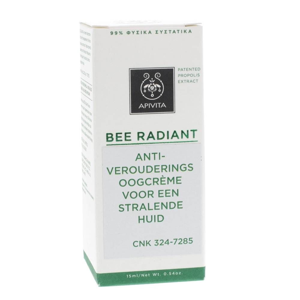 Emballage blanc avec accents verts. Inscription: Apivita, Bee Radiant, crème contour des yeux anti-âge. Contient 99% d'ingrédients naturels.