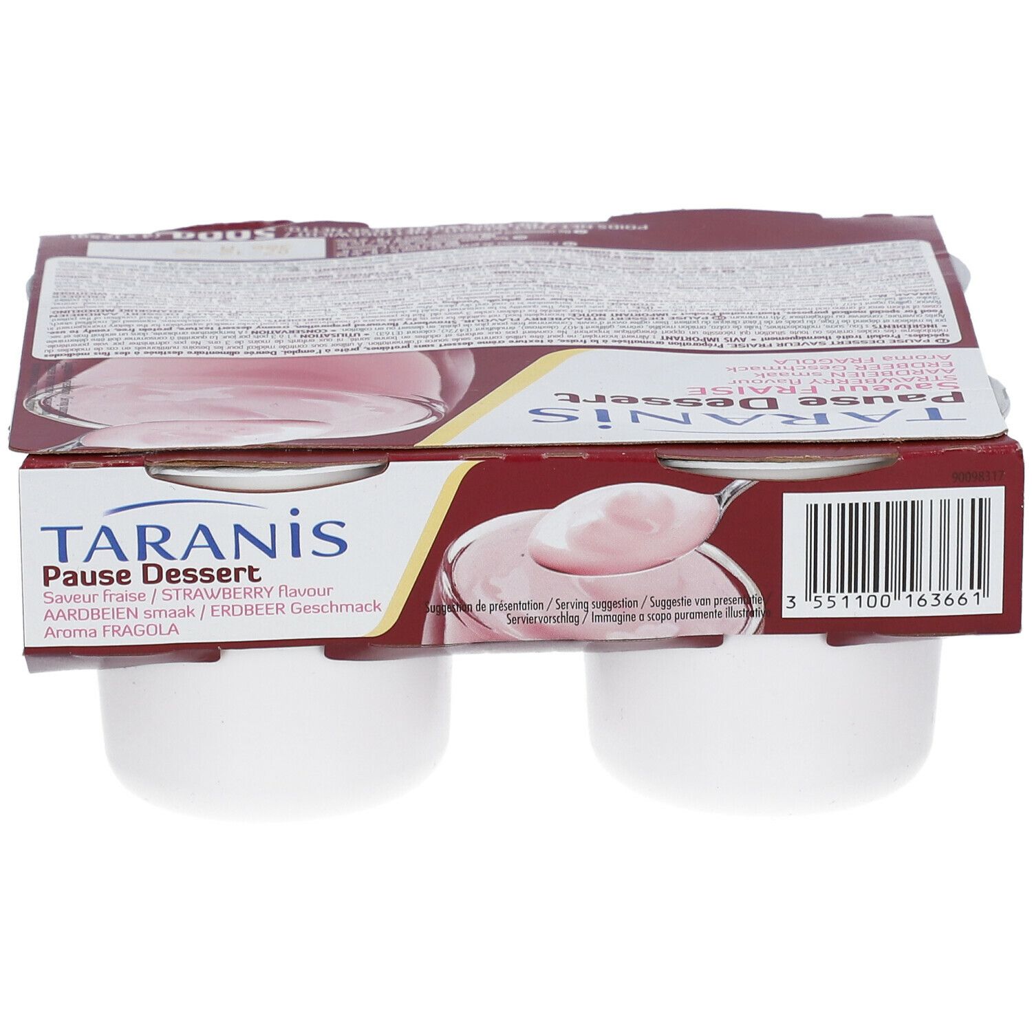 Verpakking met vier witte dessertbekers. Opschrift: TARANIS Pause Dessert aardbei smaak. Kartonnen verpakking.