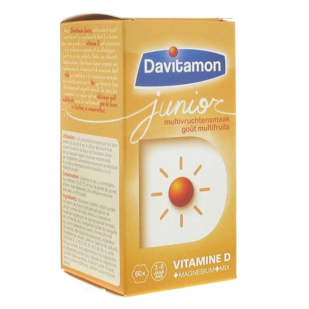 Boîte jaune Davitamon Junior. Inscription : Multivruchtensmaak, goût multifruits. Contient de la vitamine D et du magnésium.
