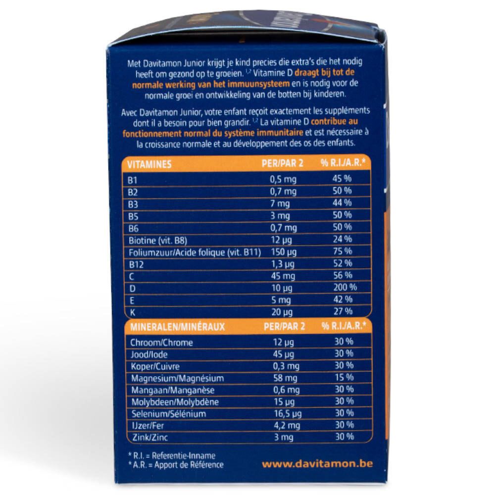 Achterkant verpakking Davitamon Junior. Bevat informatie over vitaminen, mineralen en voedingswaarden.