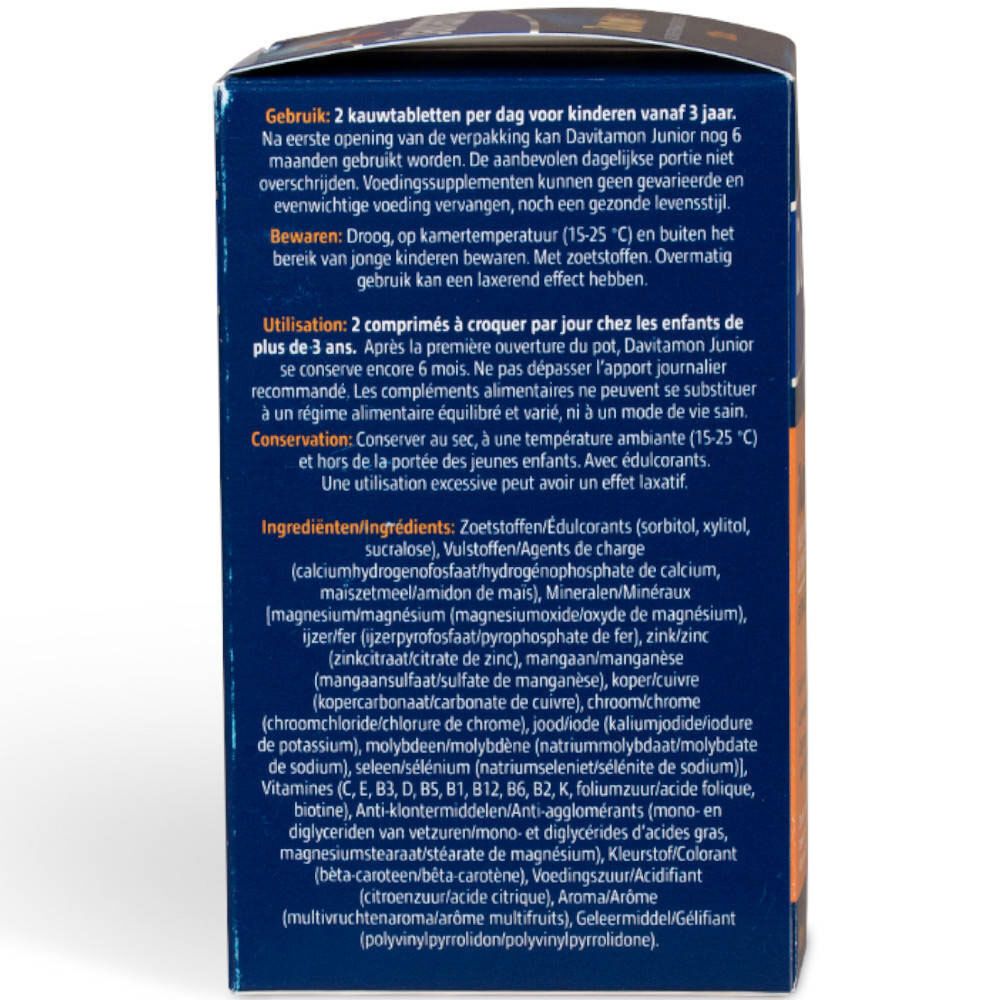 Achterkant verpakking Davitamon Junior. Bevat informatie over gebruik, bewaring en ingrediënten.