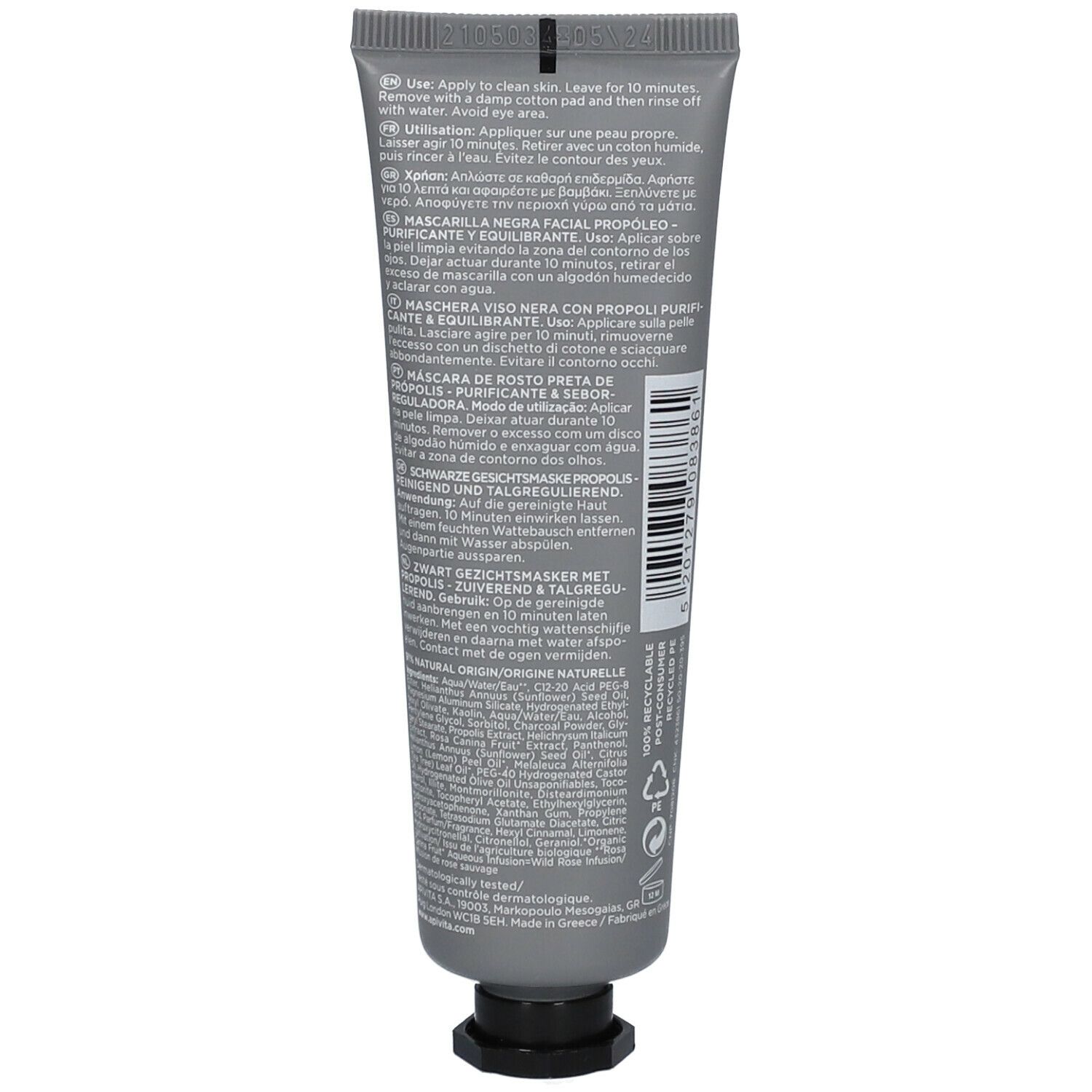 Tube gris avec bouchon noir. Texte multilingue. Nom du produit non visible.